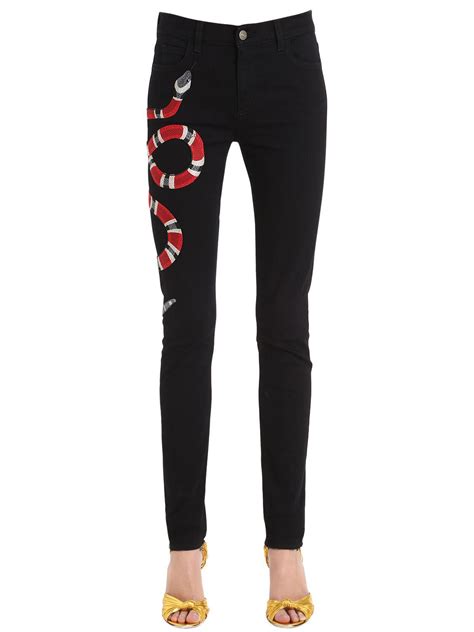 gucci snake jeans women